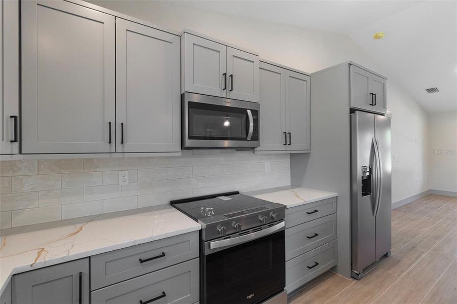 Furnished interior view inside a new home in , Port Charlotte (Image 9).