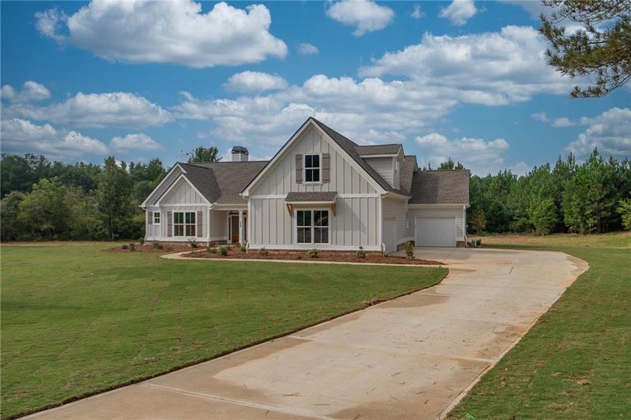 Front exterior of a new home in , Social Circle, GA, highlighting curb appeal (Image 1). Front exterior of a new home in , Social Circle, GA, highlighting curb appeal (Image 1).