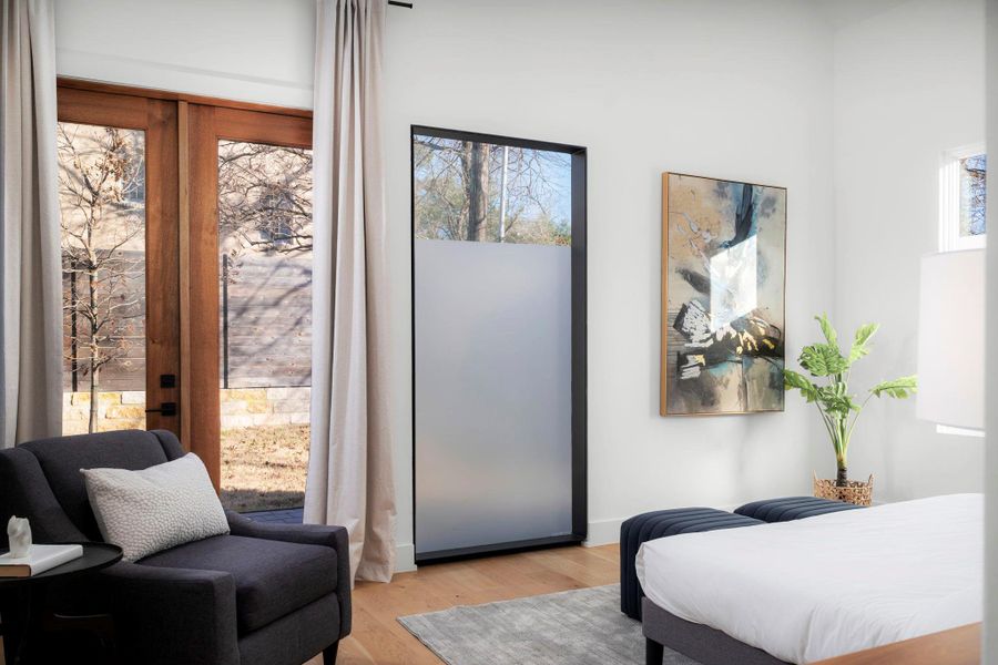 Bedroom with light wood-style flooring
