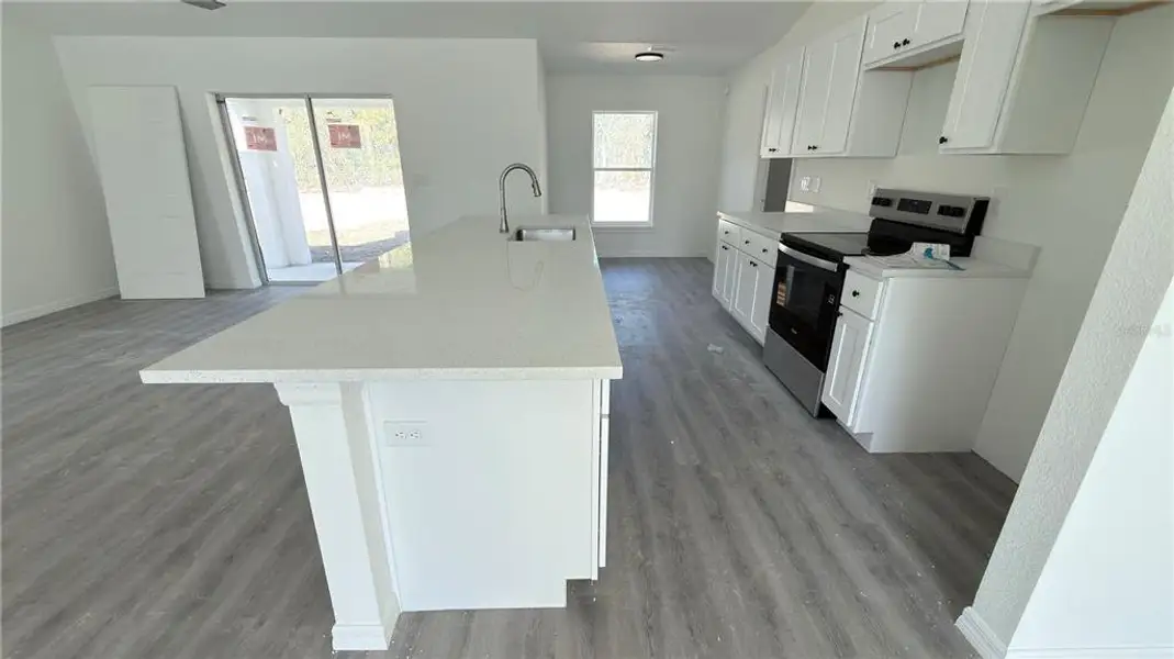 Furnished interior view inside a new home in , Dunnellon (Image 3).