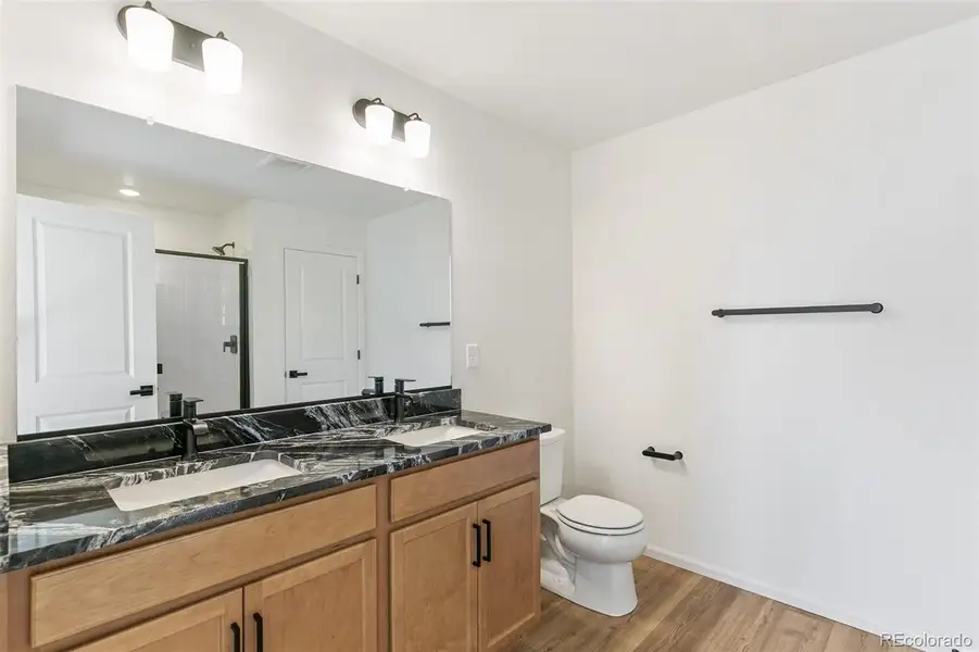 Furnished interior view inside a new home in Turnberry Villas, Commerce City (Image 12).