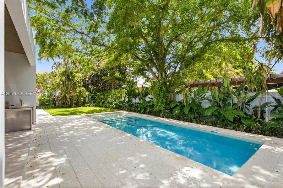 Exterior details and patio area of a home in , Miami Springs (Image 15). Exterior details and patio area of a home in , Miami Springs (Image 15).