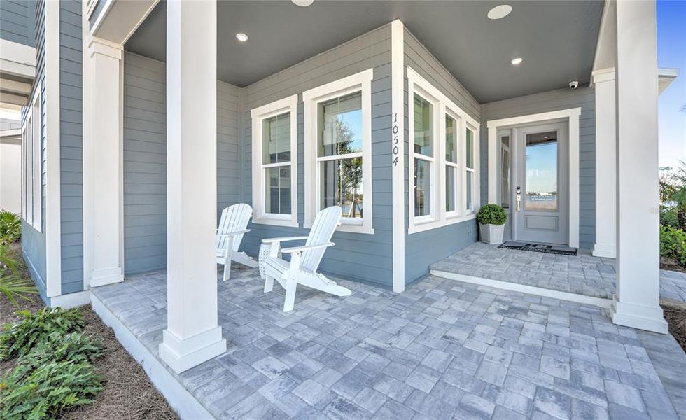 Exterior details and patio area of a home in Laureate Park, Orlando (Image 3).