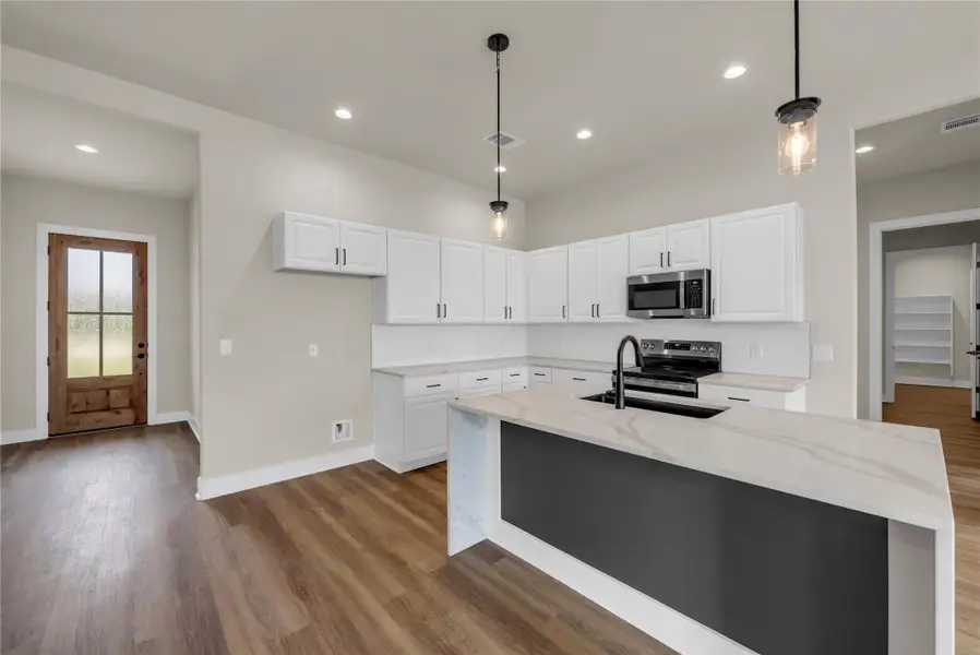 Furnished interior view inside a new home in , Bertram (Image 12).