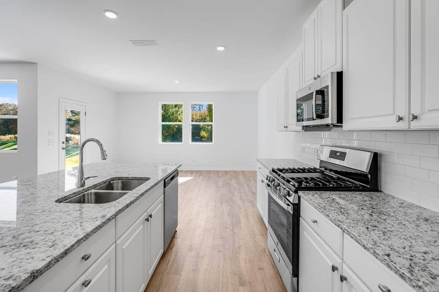 Furnished interior view inside a new home in Windance Lake, Loganville (Image 11).