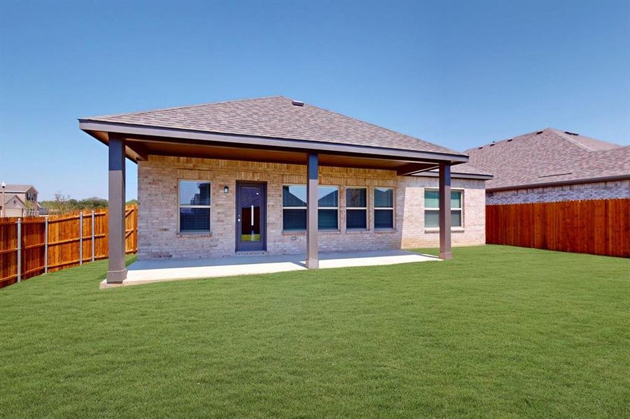Front exterior of a new home in Sagebrook, Argyle, TX, highlighting curb appeal (Image 22). Front exterior of a new home in Sagebrook, Argyle, TX, highlighting curb appeal (Image 22).
