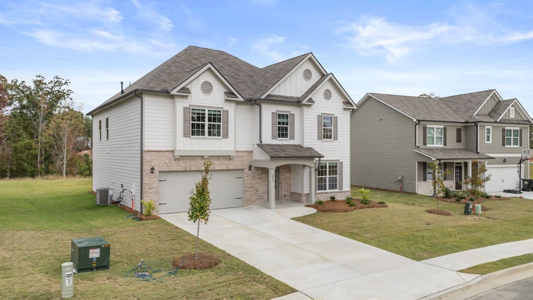 Representative exterior photo of a completed home built from the HALTON by D.R. Horton in Lost Creek, Dallas, GA (Image 24).