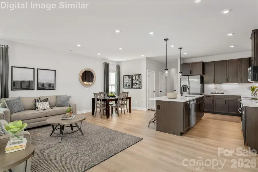 Whether You're Whipping Up A Weeknight Favorite or Hosting A Weekend Dinner Party, The Seamless Flow Between Kitchen, Dining, And Living Areas Keeps You Connected to Every Moment And Everyone In It.