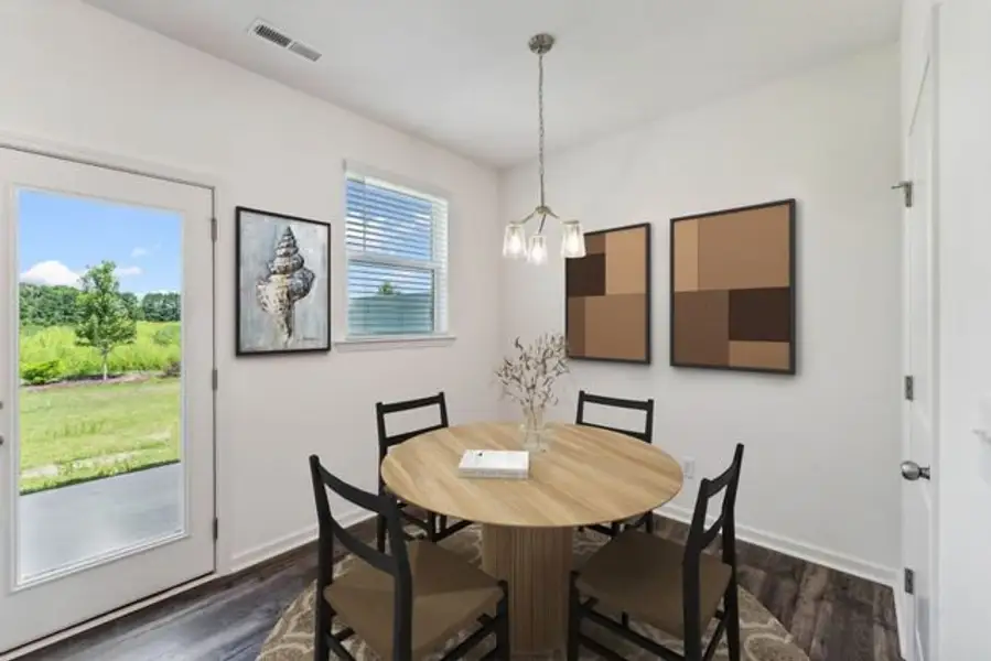 Representative furnished interior of a home built from the Lucas TH by True Homes in Hoover Townhomes, Charlotte (Image 4).