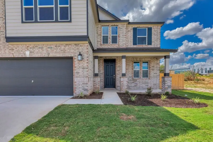 Exterior details and patio area of a home in Mustang Valley, Manor (Image 3).