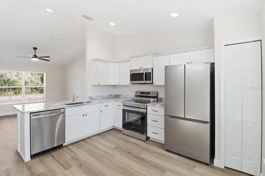 Furnished interior view inside a new home in , Citrus Springs (Image 10).