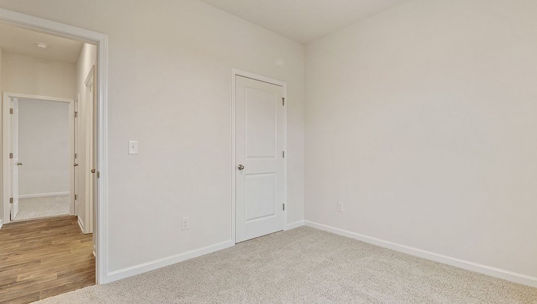 Representative unfurnished interior of a home built from the Macon by D.R. Horton in Lakestone, Woodruff (Image 20).