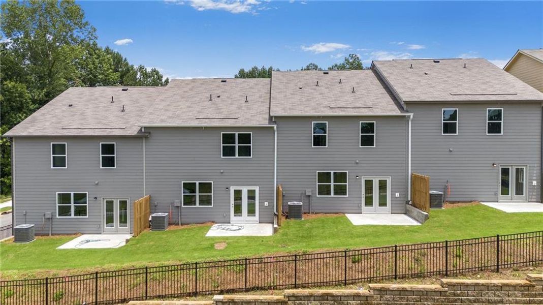Exterior details and patio area of a home in Harvest Park, Decatur (Image 3).