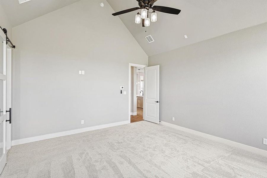 Primary Bedroom with Vaulted Ceiling