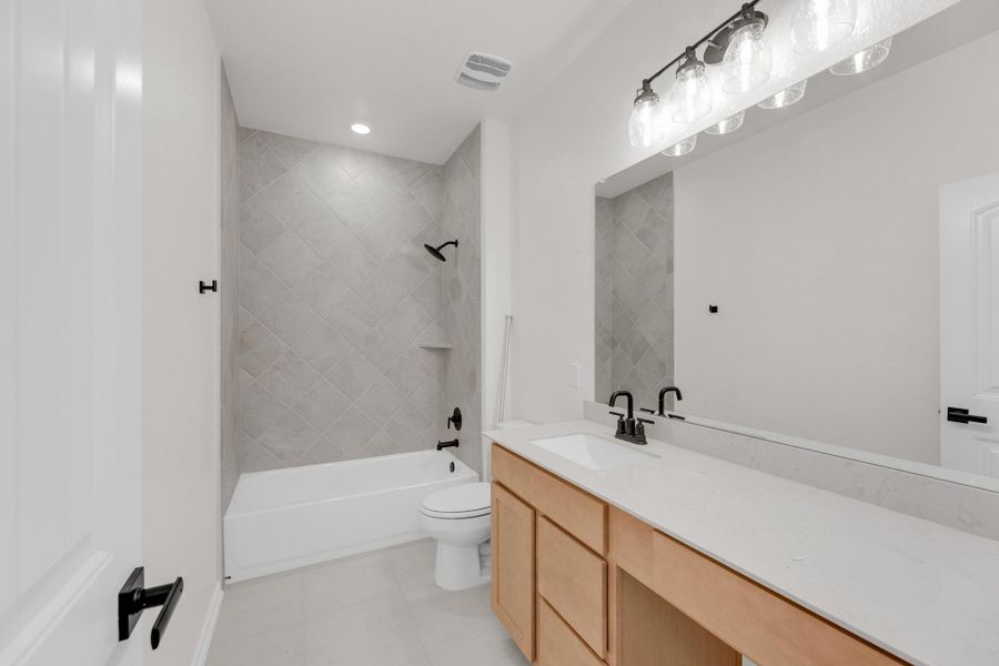 Furnished interior view inside a new home in Mustang Valley, Manor (Image 14).