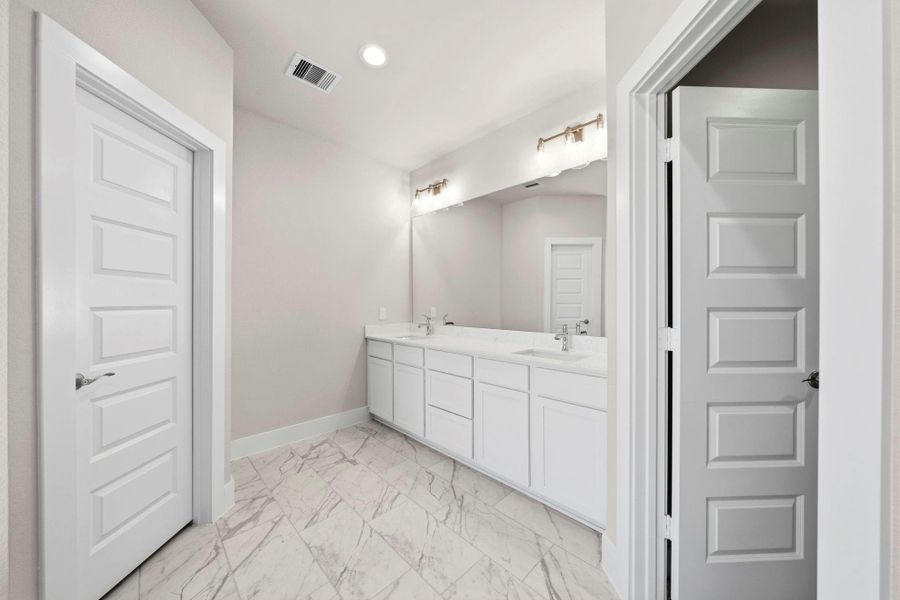 Furnished interior view inside a new home in Barton Creek Ranch, Conroe (Image 10).