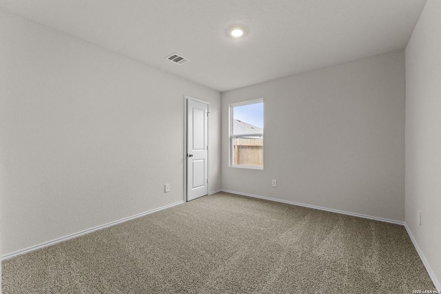 Spacious, unfurnished interior of a new home in Navarro Fields, Seguin (Image 23).