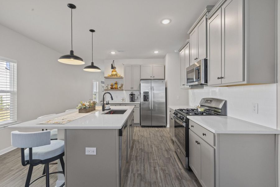 Furnished interior view inside a new home in K. Hovnanian's® Four Seasons at Lakes of Cane Bay, Summerville (Image 10). Furnished interior view inside a new home in K. Hovnanian's® Four Seasons at Lakes of Cane Bay, Summerville (Image 10).