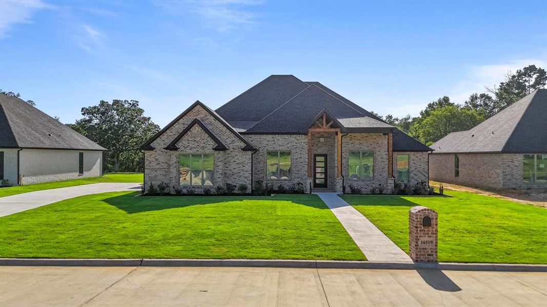 Front exterior of a new home in , Tyler, TX, highlighting curb appeal (Image 1). Front exterior of a new home in , Tyler, TX, highlighting curb appeal (Image 1).