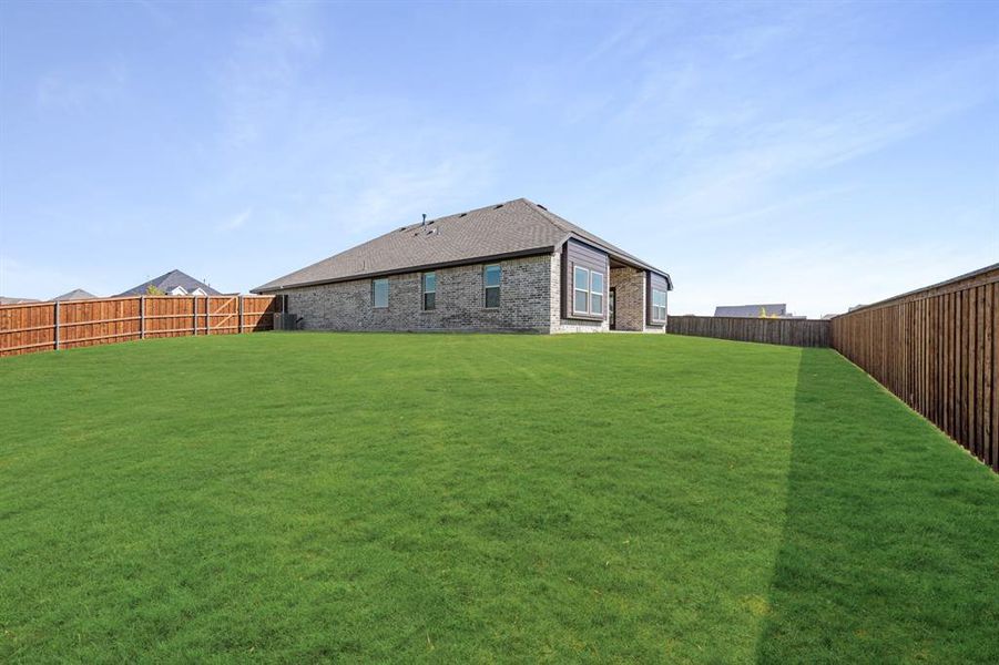 Exterior details and patio area of a home in Wildcat Ridge Phase 2 and 4, Godley (Image 24).