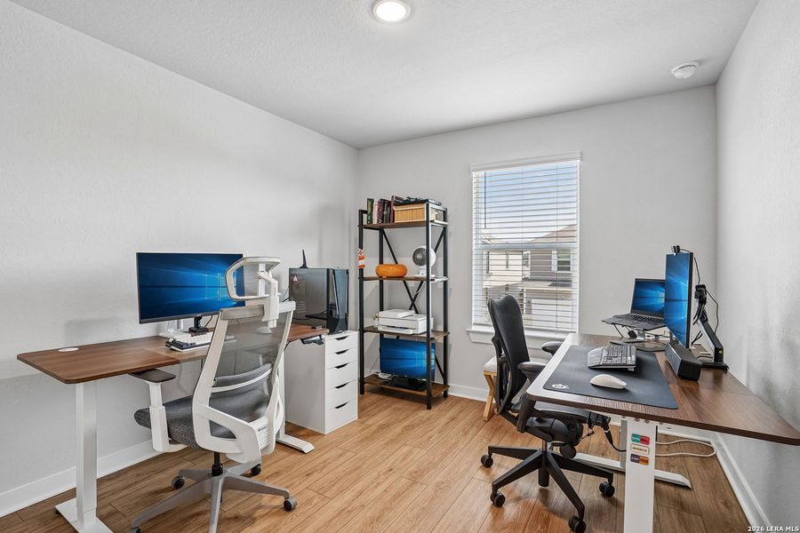 Furnished interior view inside a new home in University Village, San Antonio (Image 19).