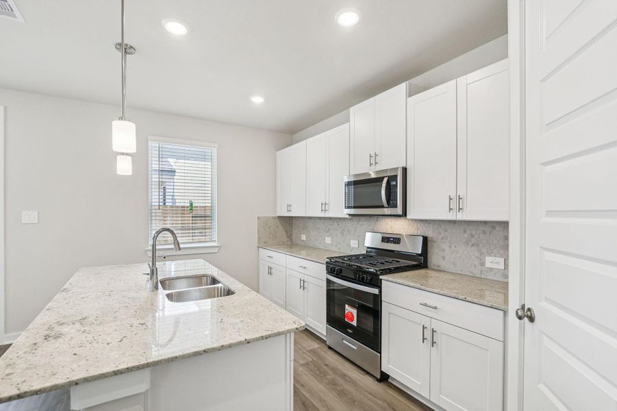 Furnished interior view inside a new home in Spring Brook Village - City Series, Houston (Image 11). Furnished interior view inside a new home in Spring Brook Village - City Series, Houston (Image 11).