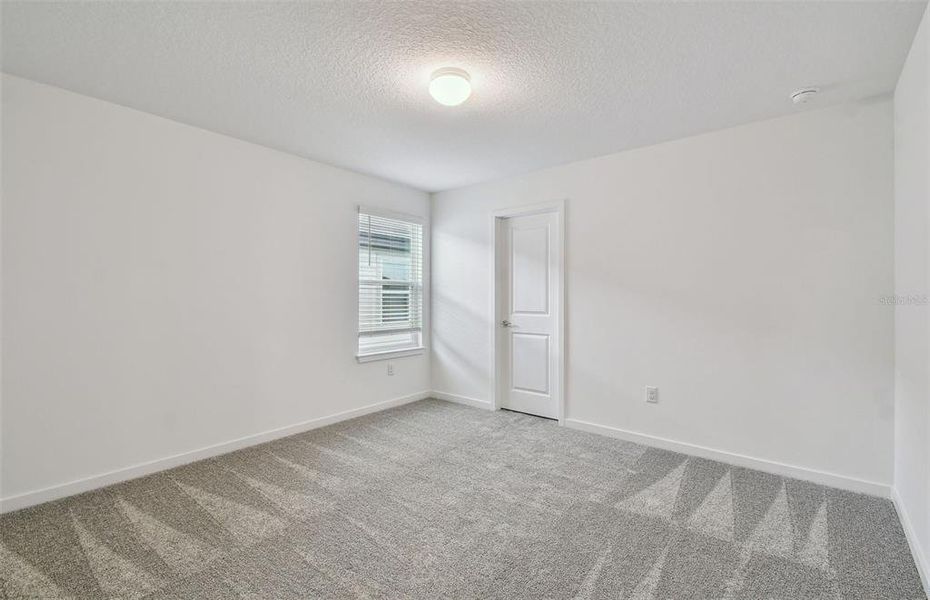 Spacious, unfurnished interior of a new home in Longmeadow at North River Ranch, Parrish (Image 16).