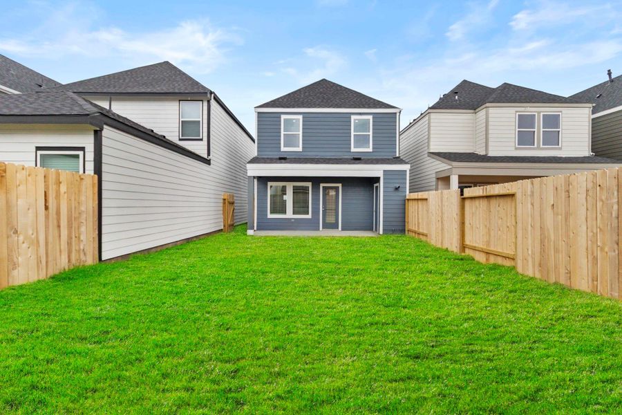 Exterior details and patio area of a home in Grand West, Houston (Image 18).