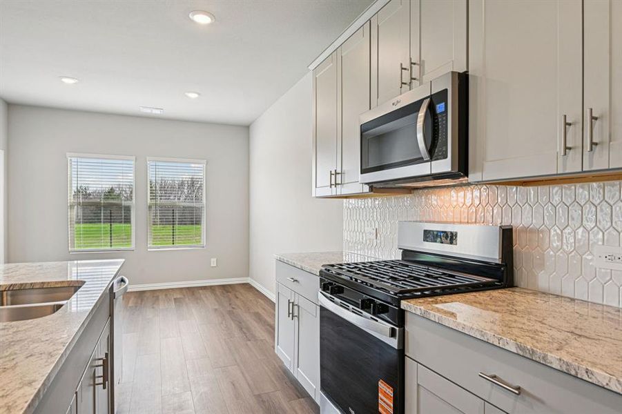 Photo is not of the actual home, but is an inspirational photo of builder’s model home and may depict options, furnishings, and/or decorator features that are not included.