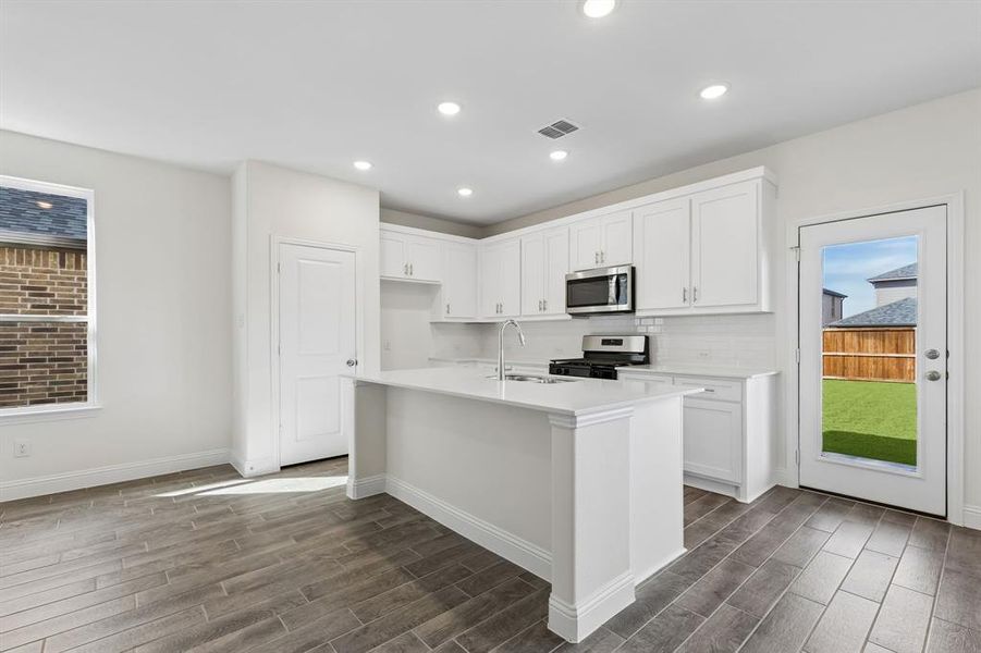Furnished interior view inside a new home in AnaCapri, Anna (Image 4).
