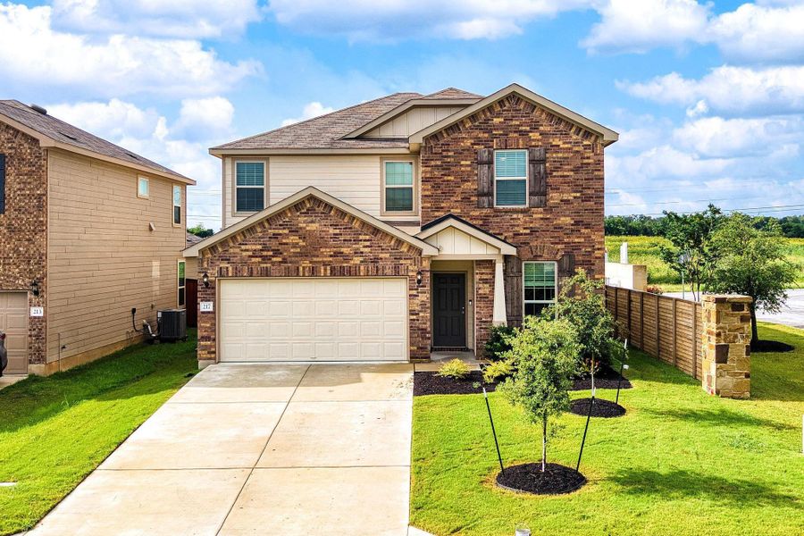 Front of the house features front entry 2 car garage. Front of the house features front entry 2 car garage.