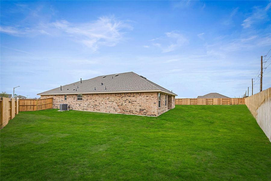 Exterior details and patio area of a home in River Ranch Trails, Dayton (Image 4).
