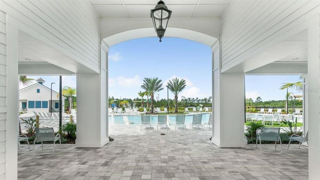 Exterior details and patio area of a home in Sawmill Branch, Palm Coast (Image 28).