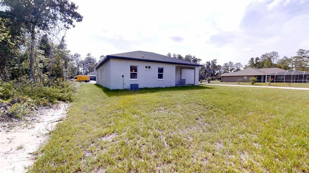 Front exterior of a new home in , Ocala, FL, highlighting curb appeal (Image 25).