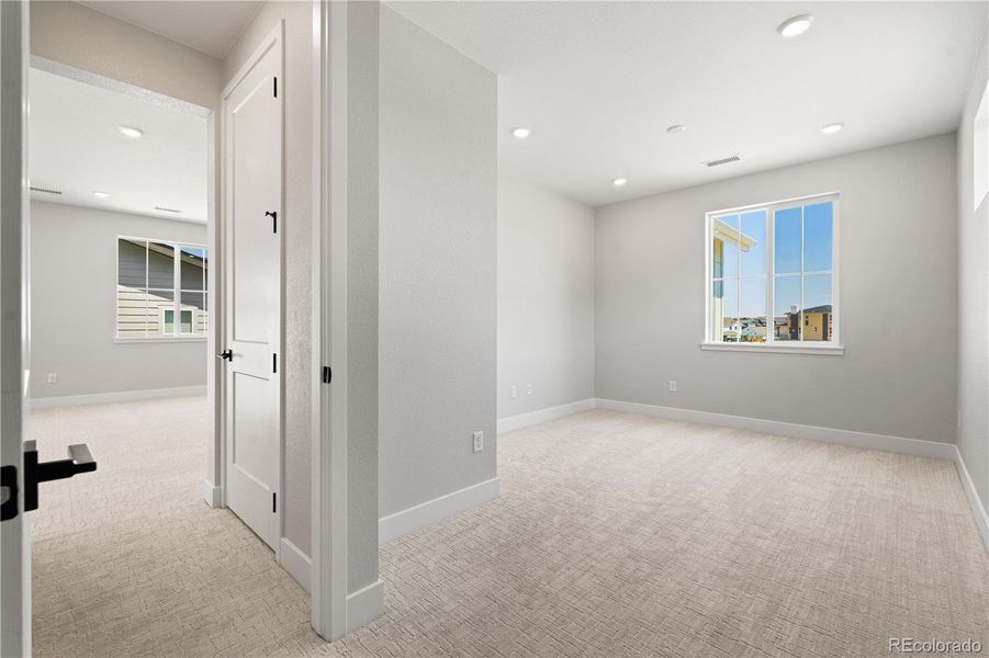 Spacious, unfurnished interior of a new home in Gallery at The Canyons, Castle Pines (Image 23).