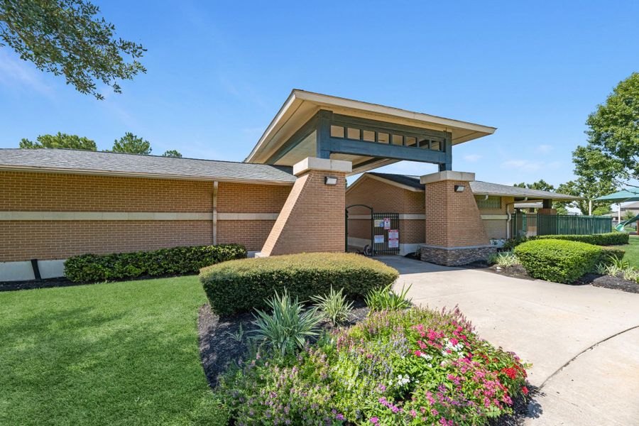 Front exterior of a new home in Grand Oaks Village, Houston, TX, highlighting curb appeal (Image 11). Front exterior of a new home in Grand Oaks Village, Houston, TX, highlighting curb appeal (Image 11).