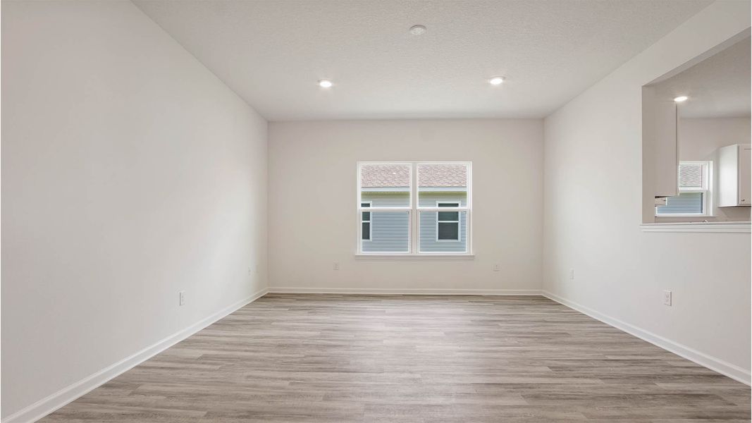 Representative unfurnished interior of a home built from the Aspen by D.R. Horton in Owl's Head East, Freeport (Image 20).