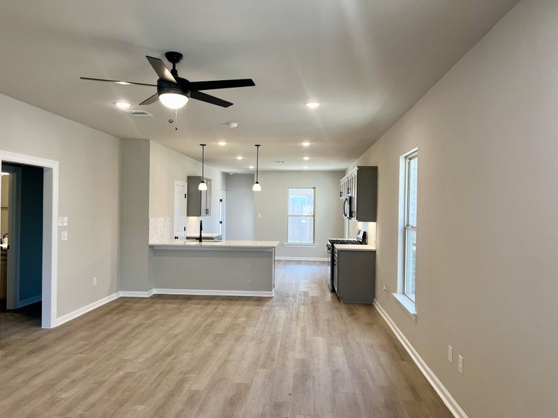 Front exterior of a new home in Emberly, Beasley, TX, highlighting curb appeal (Image 10).