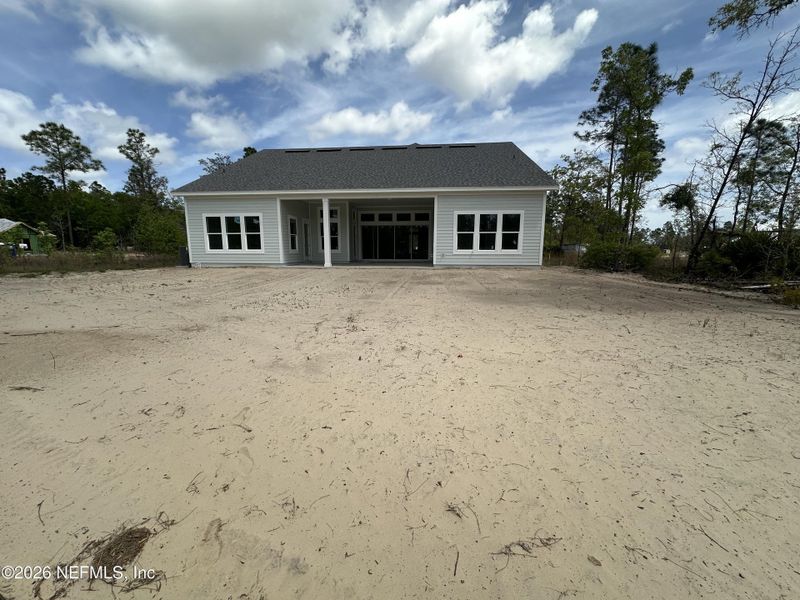 Exterior details and patio area of a home in SilverLeaf, St. Augustine (Image 3).