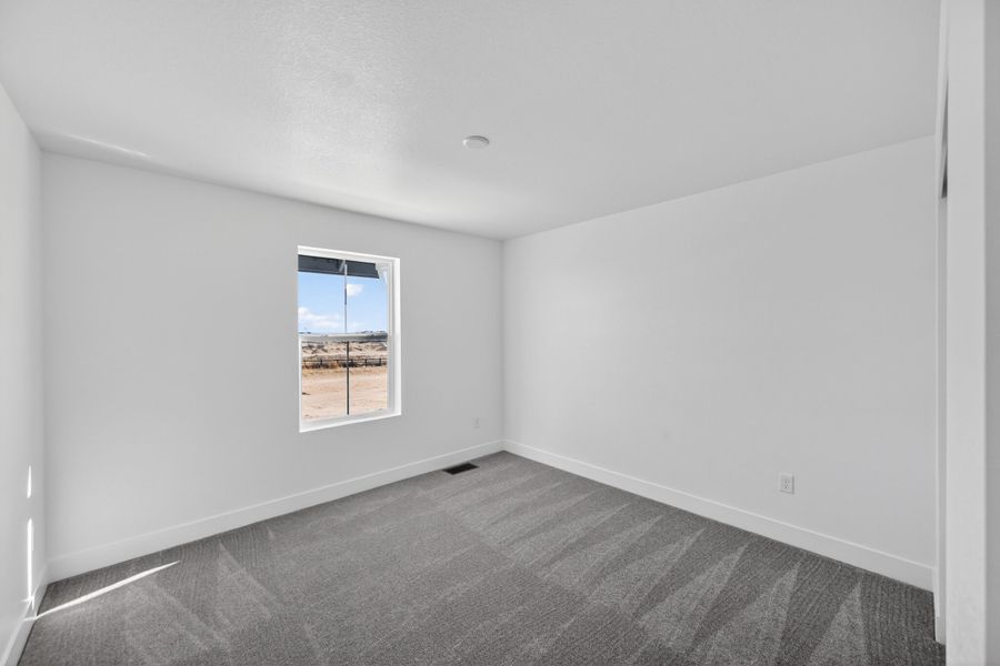 Spacious, unfurnished interior of a new home in Macanta, Castle Rock (Image 19).