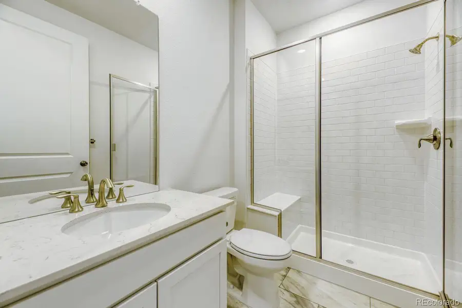 Furnished interior view inside a new home in Newlin Crossing, Parker (Image 10).