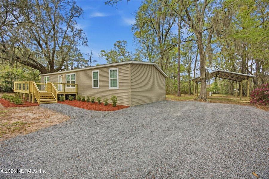Exterior details and patio area of a home in , Macclenny (Image 14).