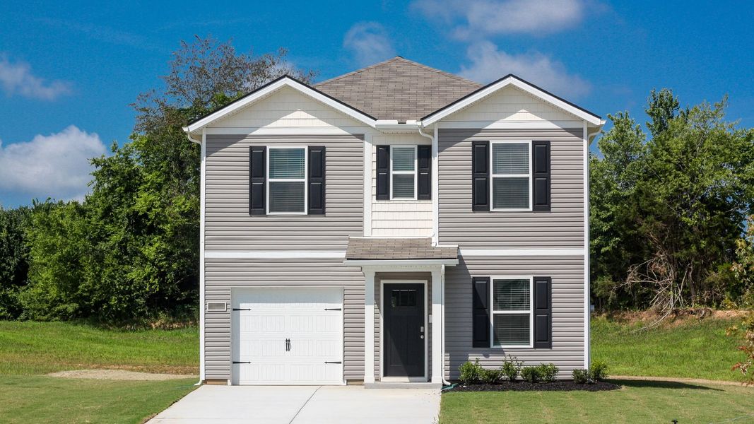 Front exterior of a new home in Parkside Point, Portland, TN, highlighting curb appeal (Image 1). Front exterior of a new home in Parkside Point, Portland, TN, highlighting curb appeal (Image 1).