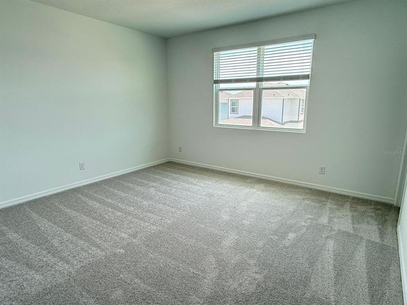 Spacious, unfurnished interior of a new home in Cypress Bluff, Groveland (Image 6).