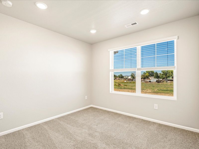 The Breckenridge floorplan interior image taken at a Meritage Homes community in Berthoud, CO.