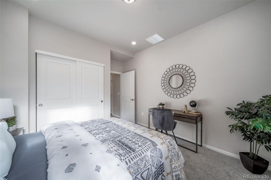 Furnished interior view inside a new home in The Reserve, Aurora (Image 13).