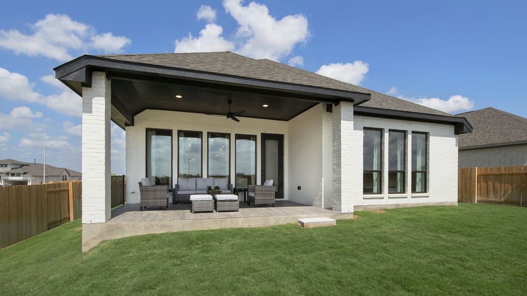 Exterior details and patio area of a home in Crosswinds, Kyle (Image 3).