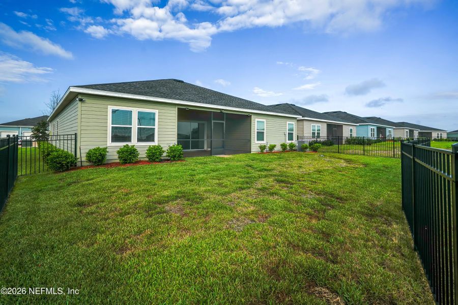 Exterior details and patio area of a home in Granary Park, Green Cove Springs (Image 29).