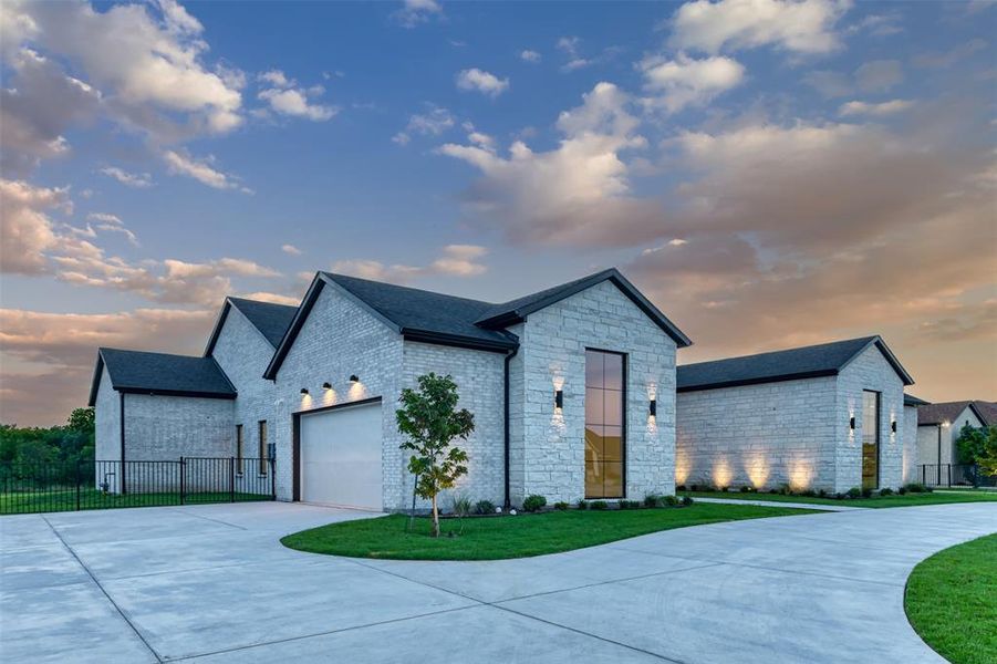 Front exterior of a new home in , Heath, TX, highlighting curb appeal (Image 2). Front exterior of a new home in , Heath, TX, highlighting curb appeal (Image 2).