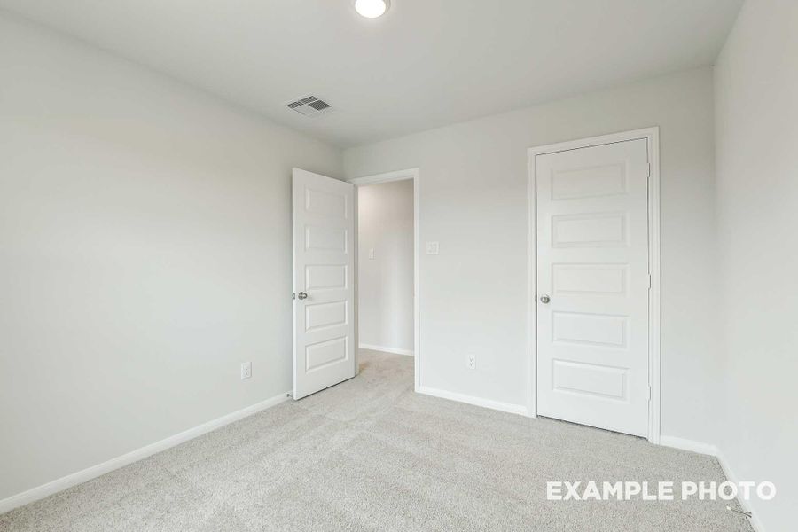 Spacious, unfurnished interior of a new home in Caney Creek Place, Conroe (Image 27).